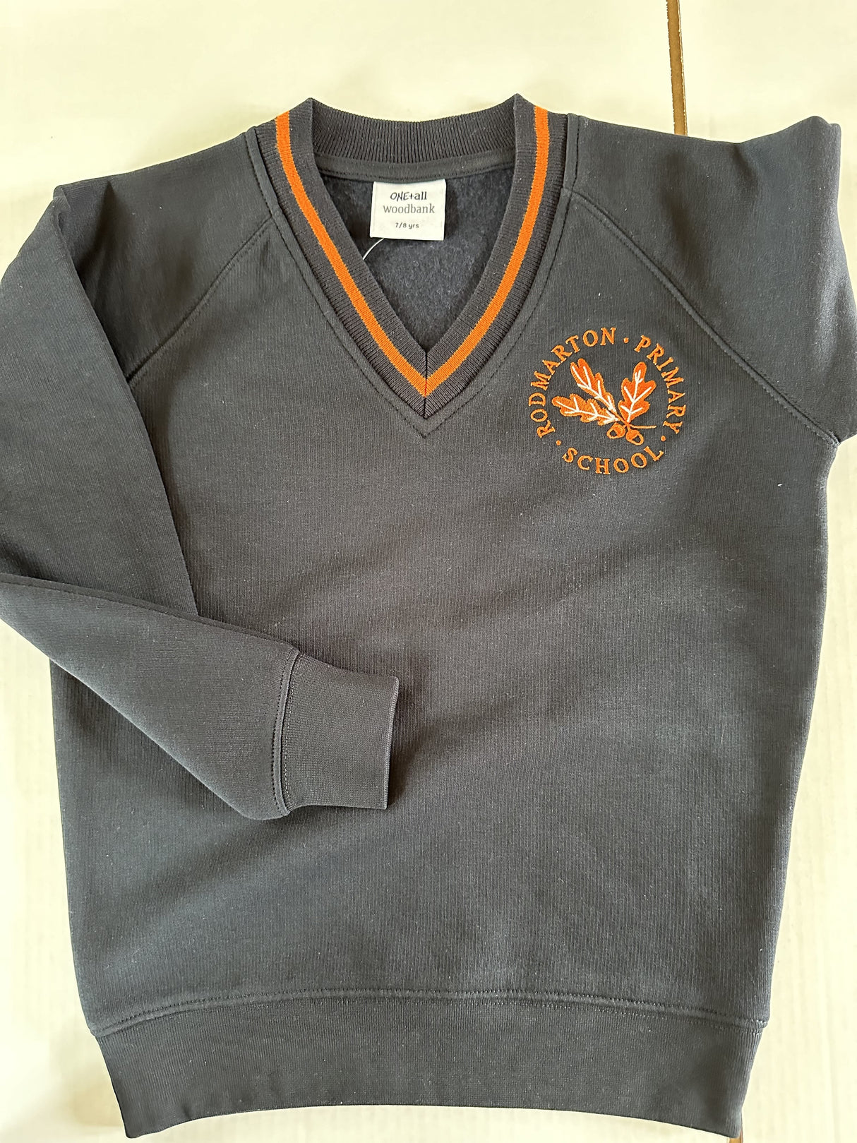 Rodmarton Primary School Navy & Orange v-neck sweatshirt with school logo